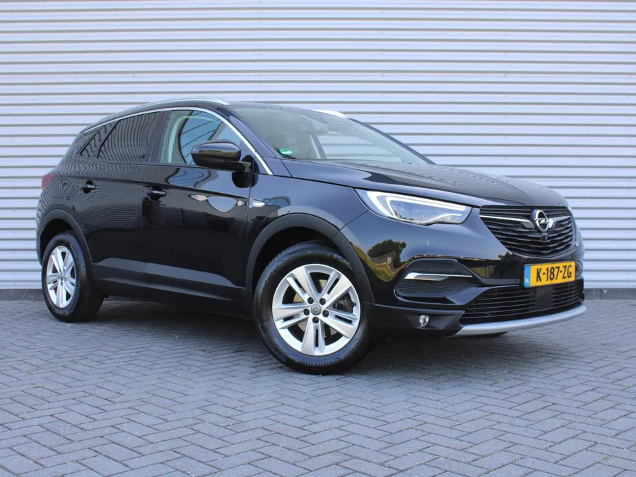 Opel Grandland X 1.2 Turbo Business Elegance | Camera | Telefoonlader | Clima  | Dodehoek detectie | Cruise | Navi | LED | 17” LM | Half stof/leer |