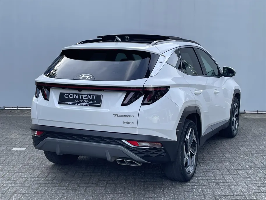 Hyundai Tucson 1.6 T-GDi HEV 230pk Aut. Premium Sky / Navigate + Camera / Schuif-kanteldak / Full Option! /