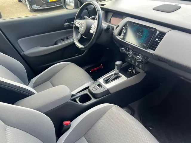 Honda Jazz 1.5 e:HEV Crosstar AUTOMAAT | FULL HYBRID | CAMERA | NAVIGATIE | ADAPTIVE CRUISE CONTROLE | NED. AUTO | LAGE KM STAND 25.738km |