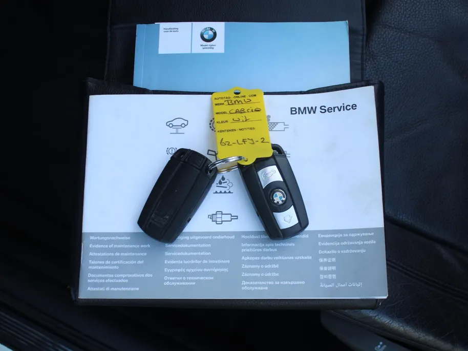 BMW 1 Serie Cabrio 118i Executive | M-Pakket | Stoelverwarming | 17' LM | Windscherm | Parkeersensor v+a | Trekhaak | Navi | Leer | Xenon | Clima |