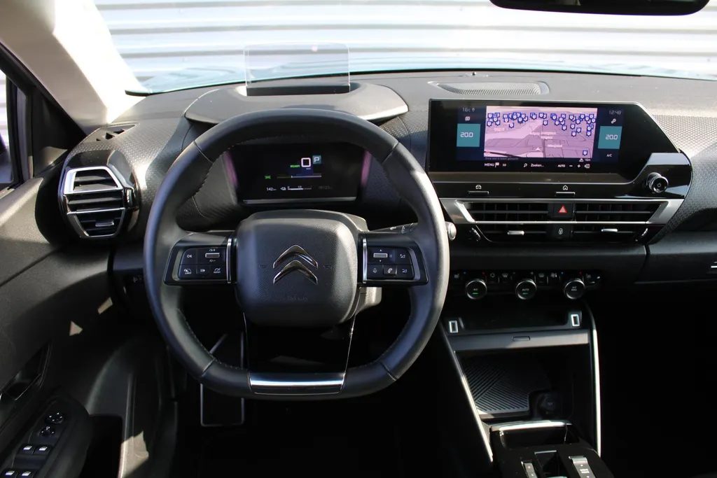 Citroën ë-C4 Shine 50 kWh | Airco | Cruise | Navi | Keyless | Trekhaak | LM Velgen | Heads Up Display | Stoelverwarming |