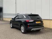 Ford Kuga 2.5 PHEV 225 pk Titanium Winter Pack - Draadloos opladen telefoon Origineel NL auto met weinig km.
