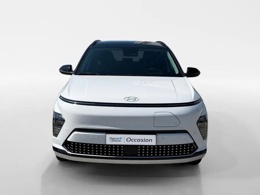 Hyundai Kona Electric Comfort Smart 64.8 kWh | TWO TONE | APPLE CARPLAY / ANDROID AUTO | SNELLADEN | PARKEERHULP | incl fabrieksgarantie!