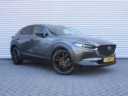 Mazda CX-30 2.0 e-SkyActiv-X M Hybrid Homura | Stoel-/stuurverwarming | Camera | 18' LM | LED | HUD | Dodehoek detectie | Elek. achterklep | Cruise adapt. |