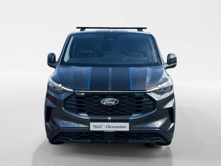Ford Transit Custom 300 2.0 TDCI L2H1 Sport | Automaat | Adapt. Cruise control | BLIS | Winter pack | Elektr. bestuurdersstoel | Parkeersensoren voor en achter | Achteruitrijcamera | Navigatie | Apple carplay & Android auto | 18' lichtmetalen velgen | Bovag garantie |