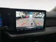 Ford E-Transit Courier Limited 44 kWh 136 pk | DEMO | Adaptive cruise control | Achteruitrij camera | Verdiepte tussenwand | Trekhaak | Navigatie | Direct leverbaar!