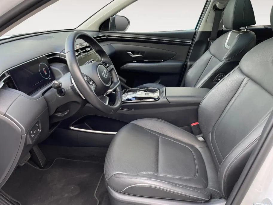 Hyundai Tucson 1.6 T-GDI PHEV Premium Sky 4WD | Zeer compleet | Open dak | 360 graden camera | Stoelverwarming & koeling | Apple CarPlay & Android Auto | Memory seats |