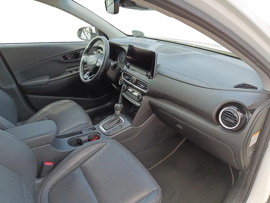 Hyundai Kona 1.6 GDI HEV Premium | Trekhaak | Apple Carplay/Android Auto | Adaptive cruise control | Dodenhoek herkenning | Leren bekleding