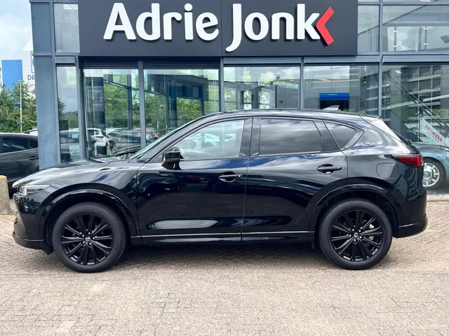 Mazda CX-5 2.0 SkyActiv-G 165 Homura AUTOMAAT | TREKHAAK | 360gr CAMERA | APPLE CARPLAY/ANDROID AUTO | HEAD-UP DISPLAY | STOEL- en STUURVERWARMING | NAVIGATIE |