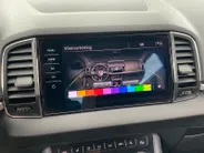 Škoda Karoq 1.0 TSi Style Business NL Auto | Trekhaak | Canton Sound | Stoelverwarming | Elektr. kofferklep | Etc.
