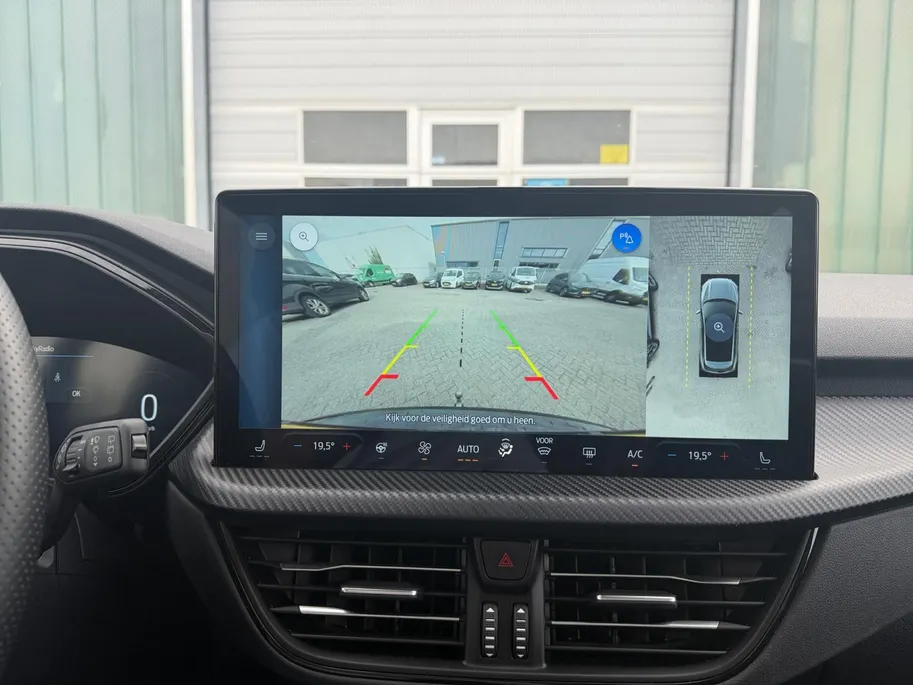 Ford Kuga 2.5 PHEV ST-Line | NL auto | Automaat | Panorama dak | Elektr. trekhaak | Winter pack | Adapt. Cruise control | BLIS | 360 graden camera | Draadloos opladen mobiel | Fabrieksgarantie tot 01-2028 |