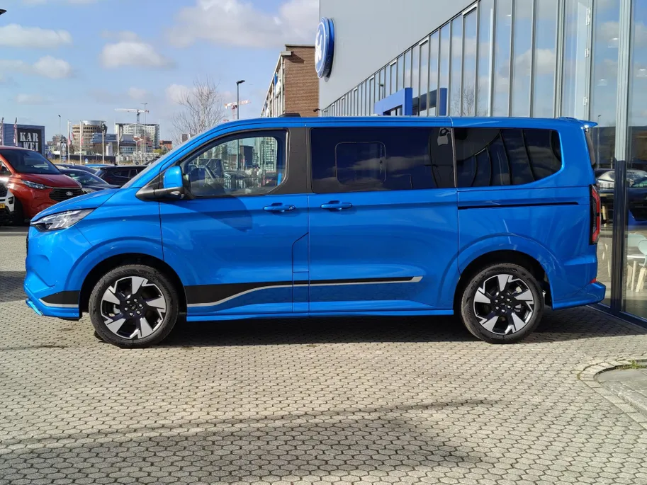 Ford Tourneo Custom E-Tourneo 340 L1H1 Sport 65 kWh - 8 PERSOONS - FULL OPTION - PANORAMADAK - ELEK. ZIJ SCHUIFDEUREN - TREKHAAK