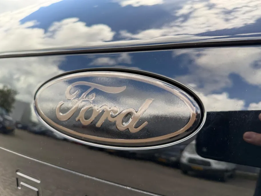 Ford Capri Premium Standard Range RWD 52 kWh | Uit Voorraad Leverbaar | €3.500,- Ready Set Ford Bonus | 374km WLTP Rijbereik | Warmtepomp | Draadloze Apple Carplay & Android Auto | B&O Premium Audio | Verwarmbare Voorstoelen | Adaptieve Cruise Control