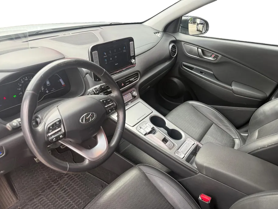 Hyundai Kona EV Premium 64 kWh | Achteruitrijcamera | Head Up Display | Dodehoek Detectie | Lederen Bekleding | Climate Control |