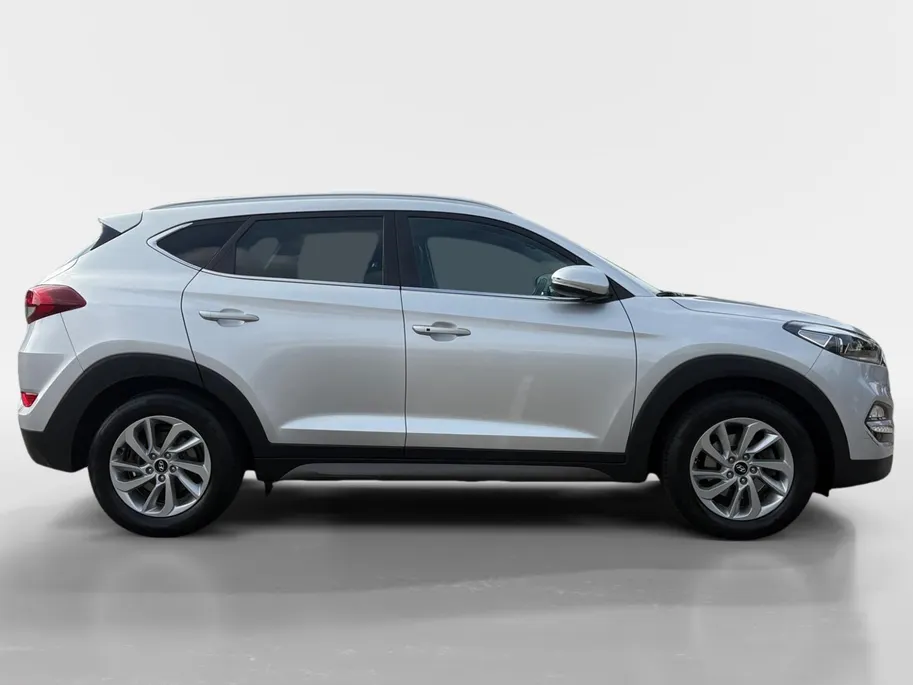 Hyundai Tucson 1.6 T-GDi Premium 4WD | Automaat! | Leder | Stoelverwarming en koeling | Navi