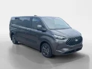 Ford Tourneo Custom 340 L2 Titanium 2.5 PHEV 233 pk | 9-persoons | TE BESTELLEN | Dual-zone airco | Inklapbare trekhaak | Cruise control | Verwarmd stuurwiel | Dubbele schuifdeuren met uitzetruiten | 17' LM velgen
