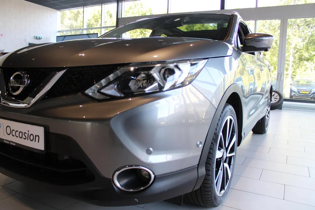 Nissan QASHQAI 1.2 Tekna | Automaat | Lederen bekleding | Electrische Stoel verstelling | 360grd camera | Parkeersensoren voor en achter | Dodehoek sensoren | Nette auto met weinig kilometers | Stoel verwarming |