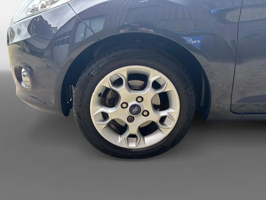 Ford Fiesta 1.4 Titanium | Voorruitverwarming | PDC | Airco | 12 maanden BOVAG garantie