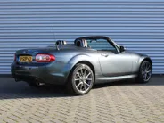 Mazda MX-5 Roadster Coupé 1.8 Hanabi | Stoelverwarming | Leer | Navi | 17" LM | Cruise | Clima | Hardtop | Nieuwstaat | Ned. auto |