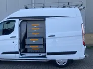 Ford Transit Custom 300 2.0 TDCI 130 pk L1H2 Trend Store Van Laadruimte inrichting - Imperiaal met dakladder - Opstaptrede achterbumper -Comfort laadschot