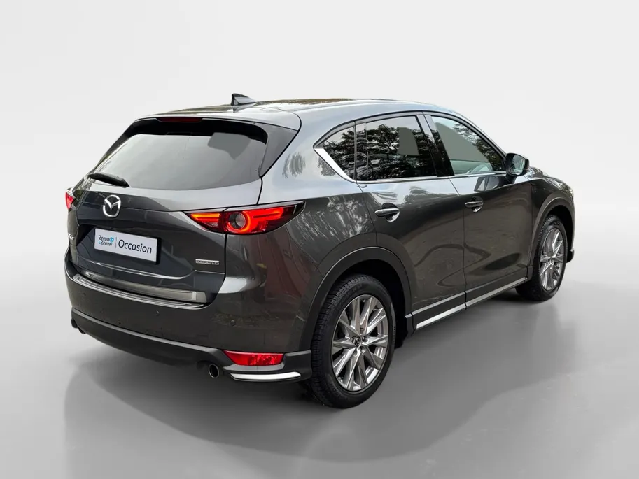 Mazda CX-5 2.0 SkyActiv-G 165 Signature | Schuif/kanteldak | 360 graden camera | Wegklapbare Trekhaak | Adaptieve Cruise Control | Navigatie | BOSE | Leder | 19' Lichtmetalen velgen
