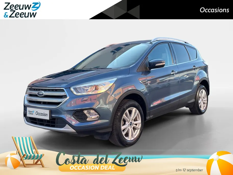 Ford Kuga 1.5 EcoBoost Titanium | Wegklapbare trekhaak| Navigatie| elec achterklep| Parkeersensoren| 4 seizoen banden| Stuur verwarming| Stoel verwarming| Vooruit verwarming| Climate Control | Zeer netjes!