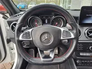 Mercedes-Benz GLA 180 Business Solution AMG AUTOMAAT | Trekhaak | Schuif/kanteldak | Navigatie | Camera | AMG-styling | Climate | Sensoren | Apple Carplay/Android Auto | Cruise | Stoelverwarming