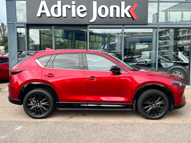 Mazda CX-5 2.0 e-SkyActiv-G M Hybrid 165 Homura Comfort Pack AUTOMAAT | TREKHAAK | LEDER | 360gr CAMERA | Bose AUDIO | STOELVENTILATIE | STOEL- en STUURVERWARMING | 1e EIG |