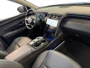 Hyundai Tucson 1.6 T-GDI PHEV Premium Sky 4WD | 66km WLTP elektrisch | Navigatie | Adaptive cruise control | Trekhaak | Apple Carplay & Android Auto | Dode hoek detectie | Draadloze telefoonlader |