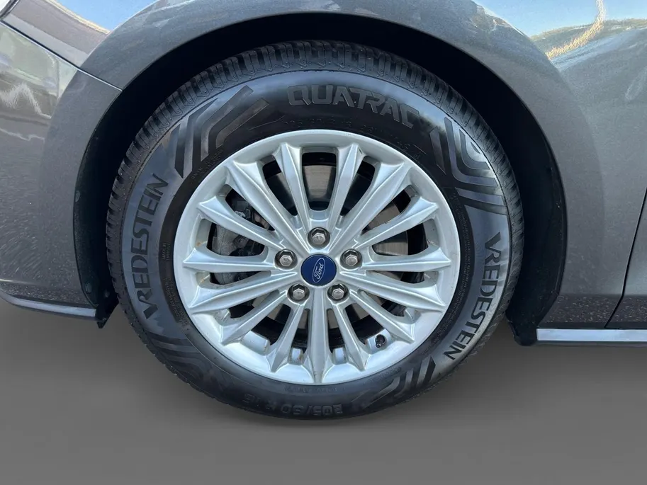 Ford Focus Wagon 1.0 EcoBoost Titanium Business | B&O | Adaptieve Cruise Control | Winter Pack | Privacy Glass | Navigatie | All weather banden