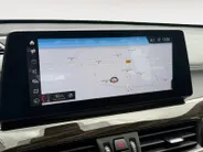 BMW X1 sDrive18i Business Edition Plus | Trekhaak | Leder | Navi | Stoelverwarming | Head-Up Display | Ambient Lighting | NL AUTO | Cruise Control | Climate Control | 12 maanden Bovag garantie |