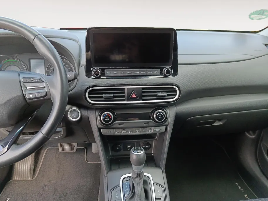 Hyundai Kona 1.6 GDI HEV Premium | Trekhaak | Apple Carplay/Android Auto | Adaptive cruise control | Dodenhoek herkenning | Leren bekleding