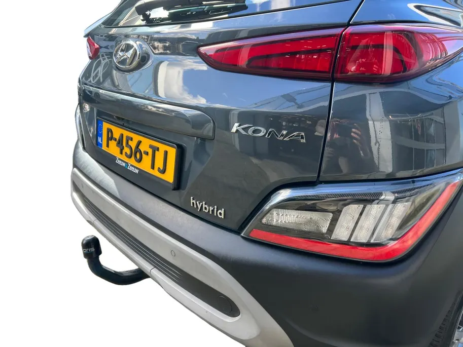 Hyundai Kona 1.6 GDI HEV Fashion Design Sky 105PK | 1ste eigenaar | Navigatie | Apple Carplay & Android Auto | Adaptive cruise control | Trekhaak | Schuif- kanteldak | Parkeersensoren achter | Stoelverwarming voor |