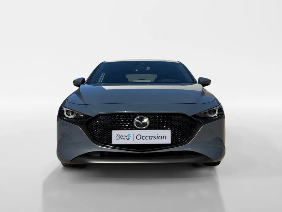 Mazda 3 2.0 e-SkyActiv-G M Hybrid 122 Comfort met Bose | Apple Carplay / Android Auto | Navigatiesysteem | Licht + Regensensor | Elektrisch Verstelbare Bestuurderstoel  | Stoel + Stuurverwarming | Parkeersensoren Voor + Achter | Camera Achter | 18'Lichtmetalen ve