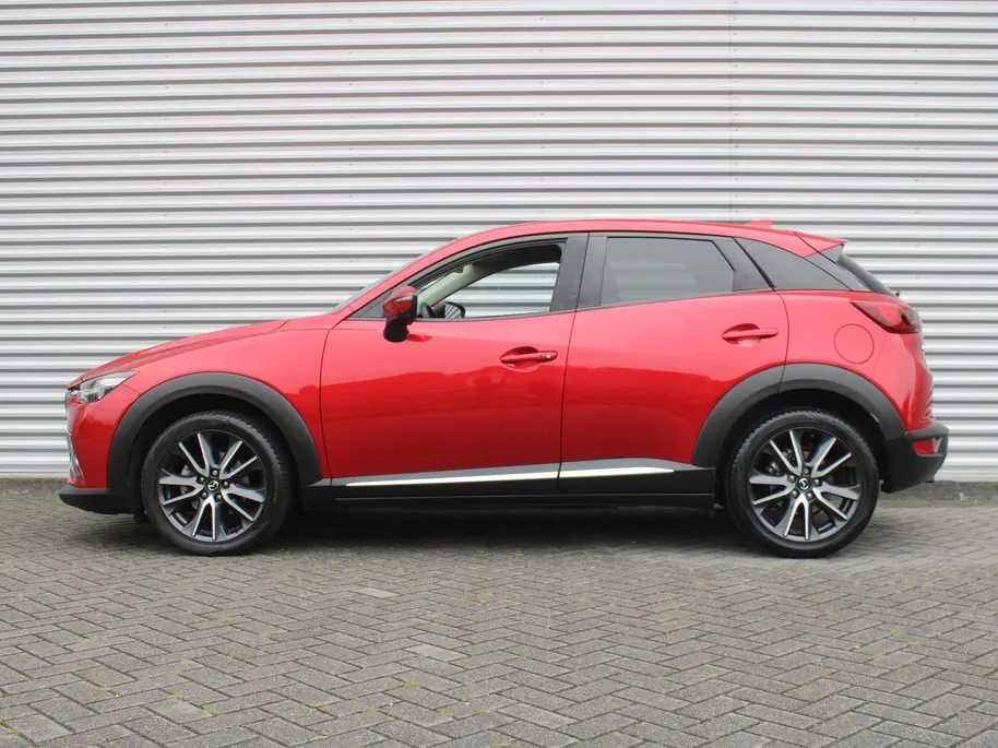 Mazda CX-3 2.0 SkyActiv-G 120 GT-M | Stuur-/stoelverwarming | Leer | Dodehoek detectie | Camera | Bose | HUD | LED | 18' LM | Cruise adapt. | Navi | Clima |