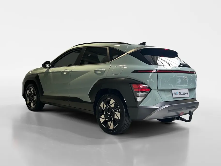 Hyundai Kona 1.6 GDI HEV Premium | Trekhaak Afn 13polig| Apple Carplay / Android Auto | Navigatiesysteem | Elektrisch Verstelbare Voorstoelen | Bestuurdersstoel + Geheugen | Parkeersensoren Voor + Achter | Camera Voor + Achter | Stoelverwarming + Stoelkoeling | Stuurv