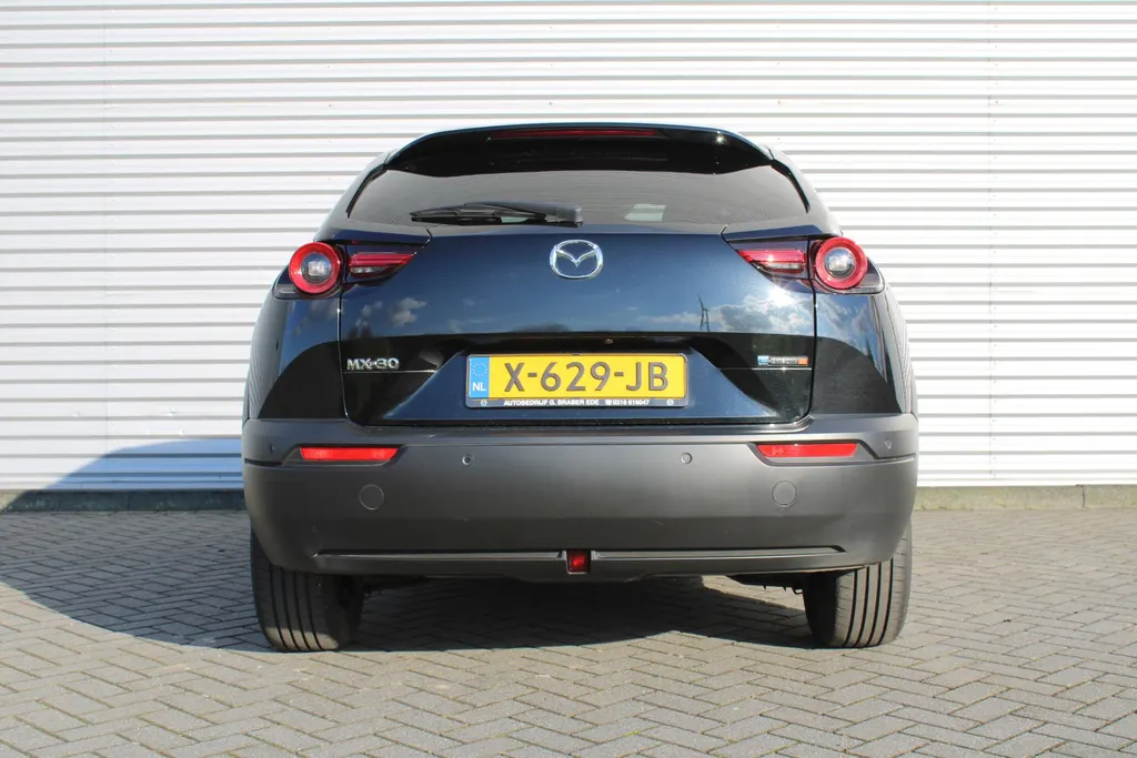 Mazda MX-30 e-SkyActiv R-EV 170 Advantage Industrial | Stoelverwarming | HUD | Dodehoek detectie | Elek. stoelverstelling | LED | 18' LM | Camera |