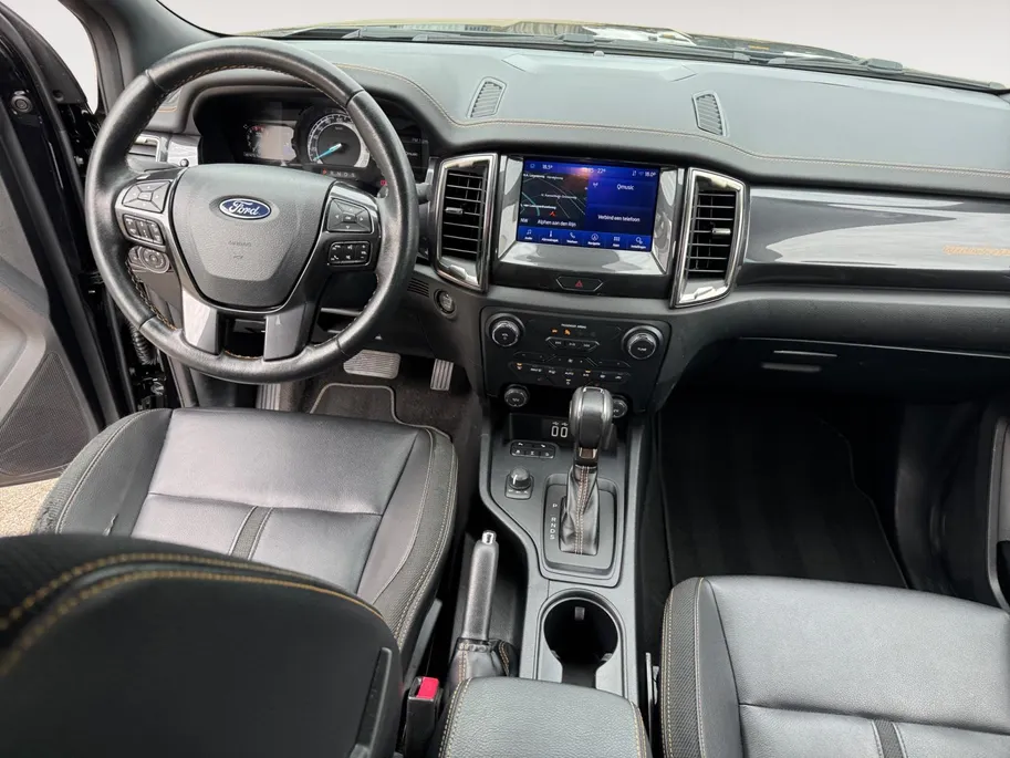 Ford Ranger 2.0 EcoBlue Wildtrak Supercab | NL auto | Dealer onderhouden | 213 pk | Trekhaak | Automaat | Rollertop | Stoelverwarming | Achteruitrijcamera | Parkeersensoren voor en achter | Adapt. cruise control | Apple carplay & Android auto | Bovag garantie |