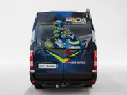 Renault Master T35 2.3 dCi 135 L3H2 Work Edition | Camper Edition | Motorsport Edition | Thule Omnistor Luifel | Airco in Leefruimte | TV | Koelkast | Magnetron | Volledig Bed | 2 Lederen Stoelen | DAB | LED Verlichting Leefruimte |