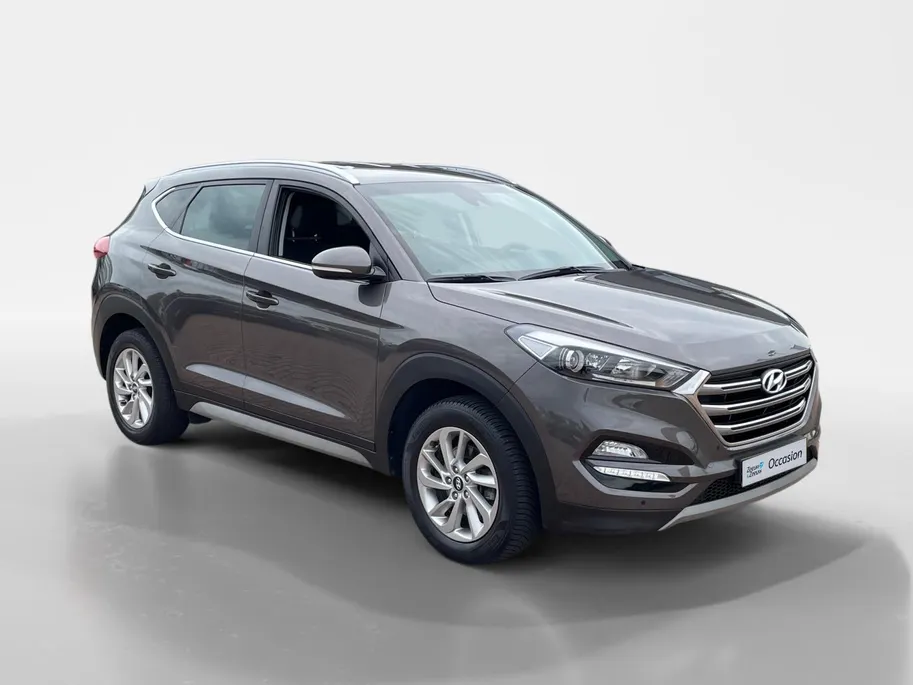 Hyundai Tucson 1.6 GDi Comfort *Navi*Camera*Trekhaak*Dual Climate Control*Cruise Control*Stoelverwarming*LM.Velgen*Zeer nette auto!