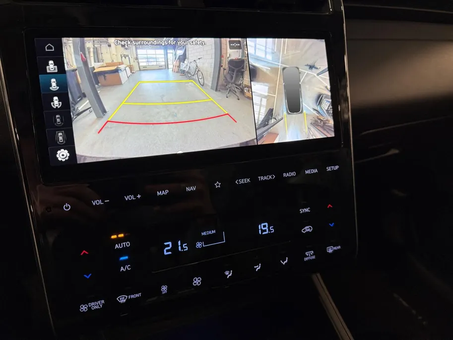 Hyundai Tucson 1.6 T-GDI PHEV Premium Sky 4WD | 66km WLTP elektrisch | Navigatie | Adaptive cruise control | Trekhaak | Apple Carplay & Android Auto | Dode hoek detectie | Draadloze telefoonlader |