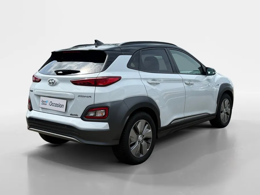 Hyundai Kona EV Premium 64 kWh | Achteruitrijcamera | Head Up Display | Dodehoek Detectie | Lederen Bekleding | Climate Control |