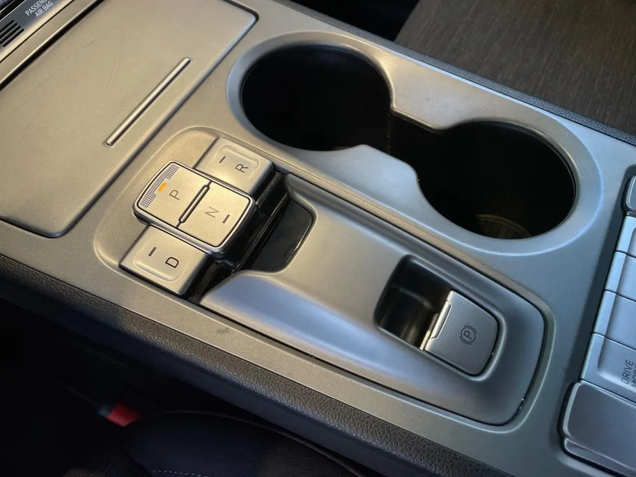 Hyundai Kona EV Fashion 64 kWh | Warmtepomp | Navigatie | Apple Carplay & Android Auto | 100% SOH | Adaptive cruise control | Climate control | Head-up display | Parkeersensoren achter |