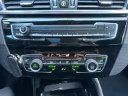 BMW X1 sDrive18i High Executive | Automaat | Head-Up Display | Automatische Achterklep | Panorama Dak | Stoelverwarming | Volledig Lederen Bekleding | Dealer Onderhouden | Camera | 12 Maanden BOVAG Garantie