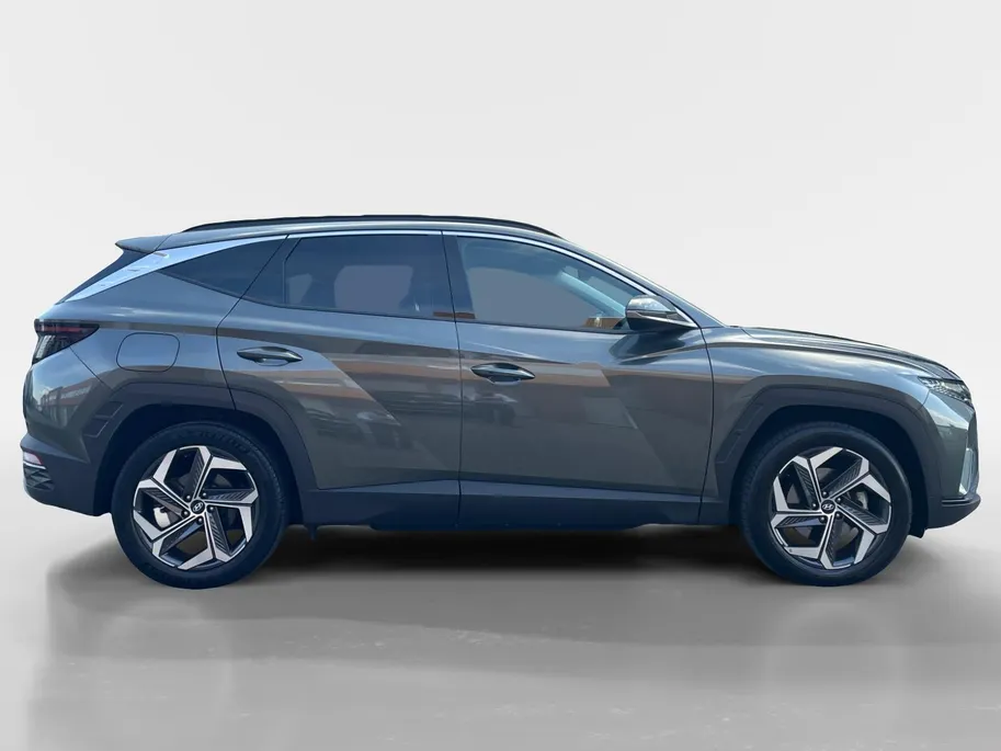 Hyundai Tucson 1.6 T-GDI PHEV Comfort Smart 4WD 1ste eigenaar | Navigatie| Climate control| Adaptieve cruise control| Stoel/stuurverwarming| Elektrische achterklep |Trekhaak|