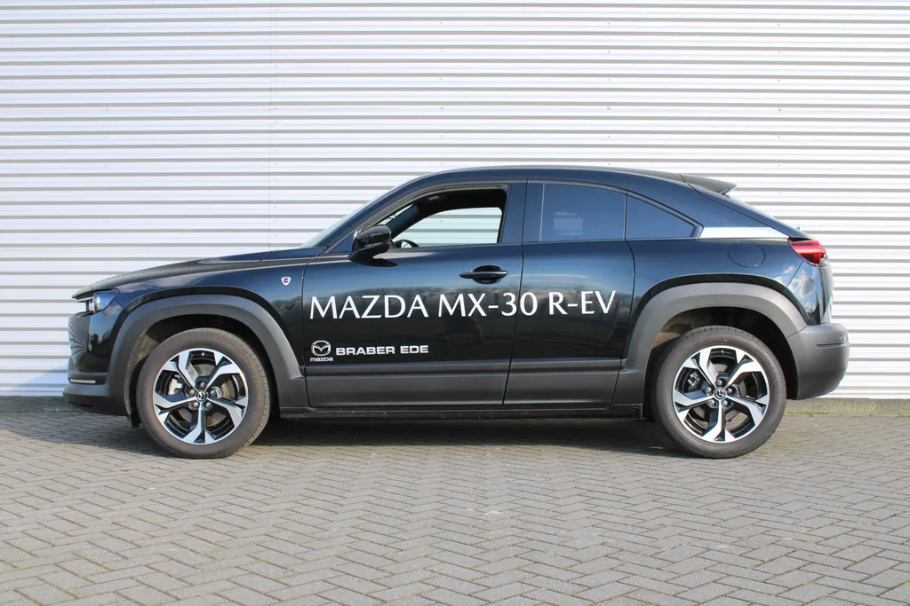 Mazda MX-30 e-SkyActiv R-EV 170 Advantage Industrial | Stoelverwarming | HUD | Dodehoek detectie | Elek. stoelverstelling | LED | 18' LM | Camera |
