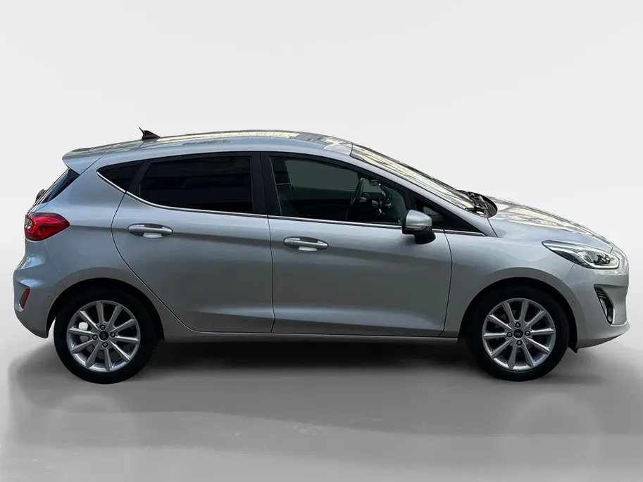 Ford Fiesta 1.0 EcoBoost Titanium | Bluetooth | Apple Carplay/Android Auto | Cruise Control | Climate Control | Camera | Navigatie | Stoelverwarming |