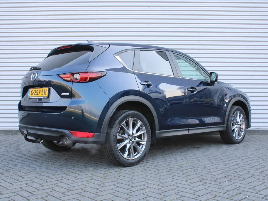 Mazda CX-5 2.0 SkyActiv-G 165 Comfort | Trekhaak | Stoel-/stuurverwarming | Dodehoek detectie | Carplay | Clima | 19' LM | Parkeersensor v+a | LED |
