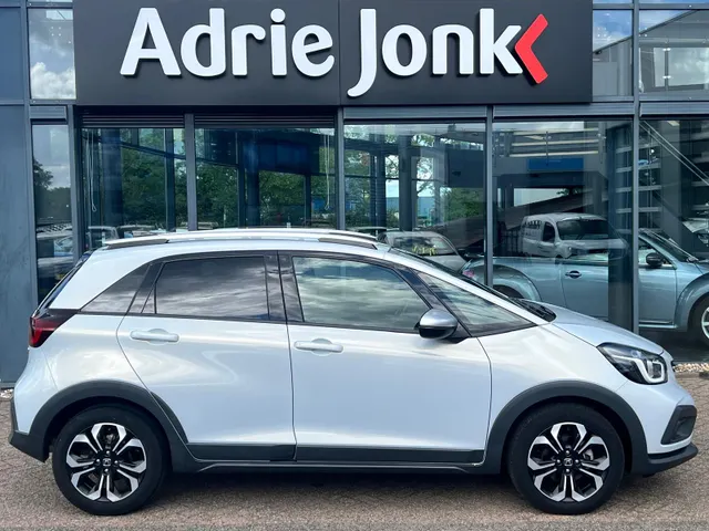 Honda Jazz 1.5 e:HEV Crosstar AUTOMAAT | FULL HYBRID | CAMERA | NAVIGATIE | ADAPTIVE CRUISE CONTROLE | NED. AUTO | LAGE KM STAND 25.738km |