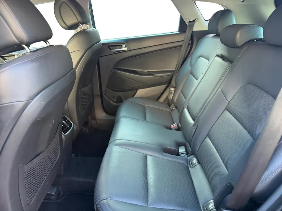 Hyundai Tucson 1.6 GDi Comfort | Elektrisch Verstelbare Stoelen | Navigatie | Bluetooth | Camera | Stoelverwarming | Cruise & Climate Control | Onderhoudshistorie | All Season Banden | 12 Maanden BOVAG Garantie